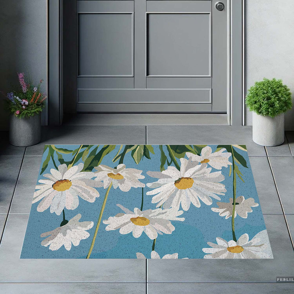 Feblilac Blue Sky Daisies PVC coil door mat on a paved patio by the entrance