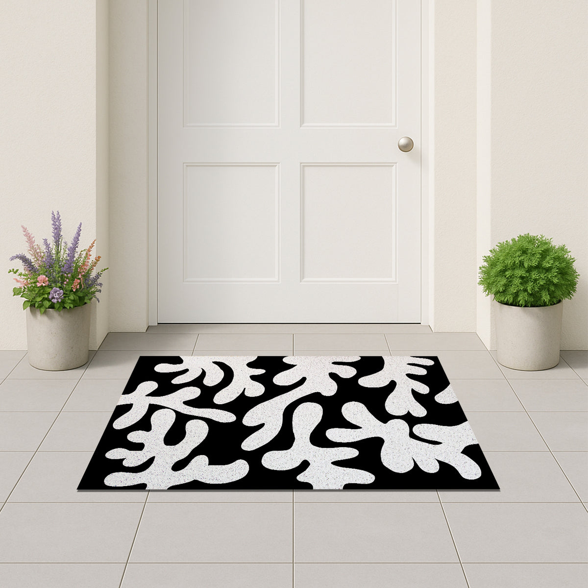 Feblilac Coral PVC coil door mat on a paved patio by the entrance