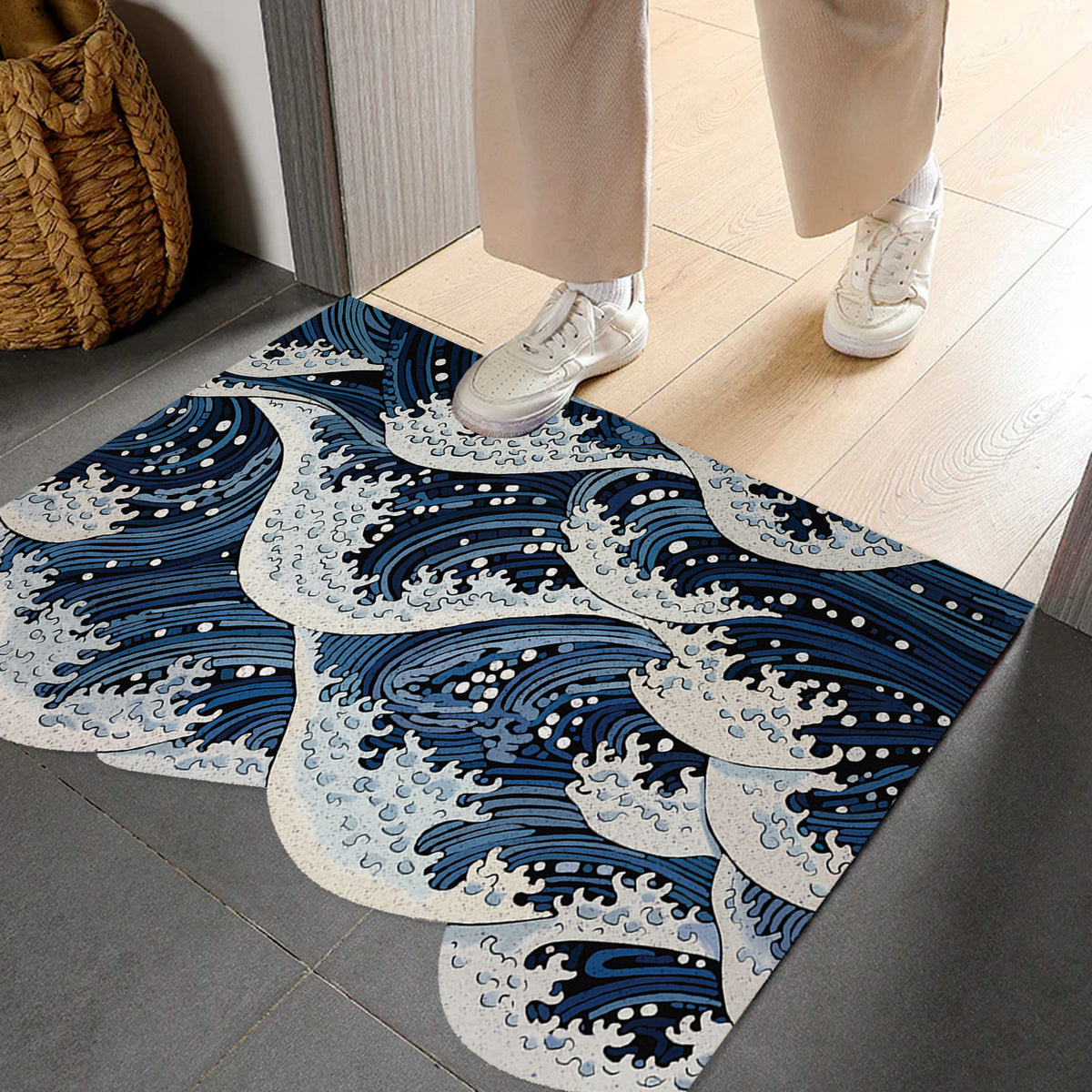 Feblilac Ukiyo-e Wave PVC coil door mat on a paved patio by the entrance