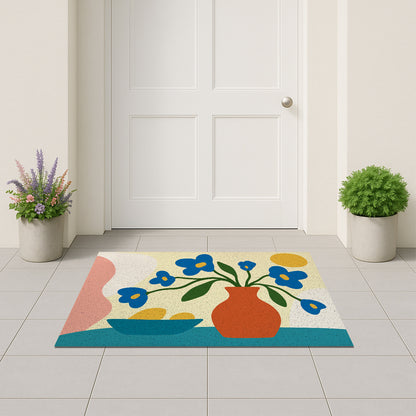 Feblilac Vase and Blue Flowers PVC coil door mat on a paved patio by the entrance