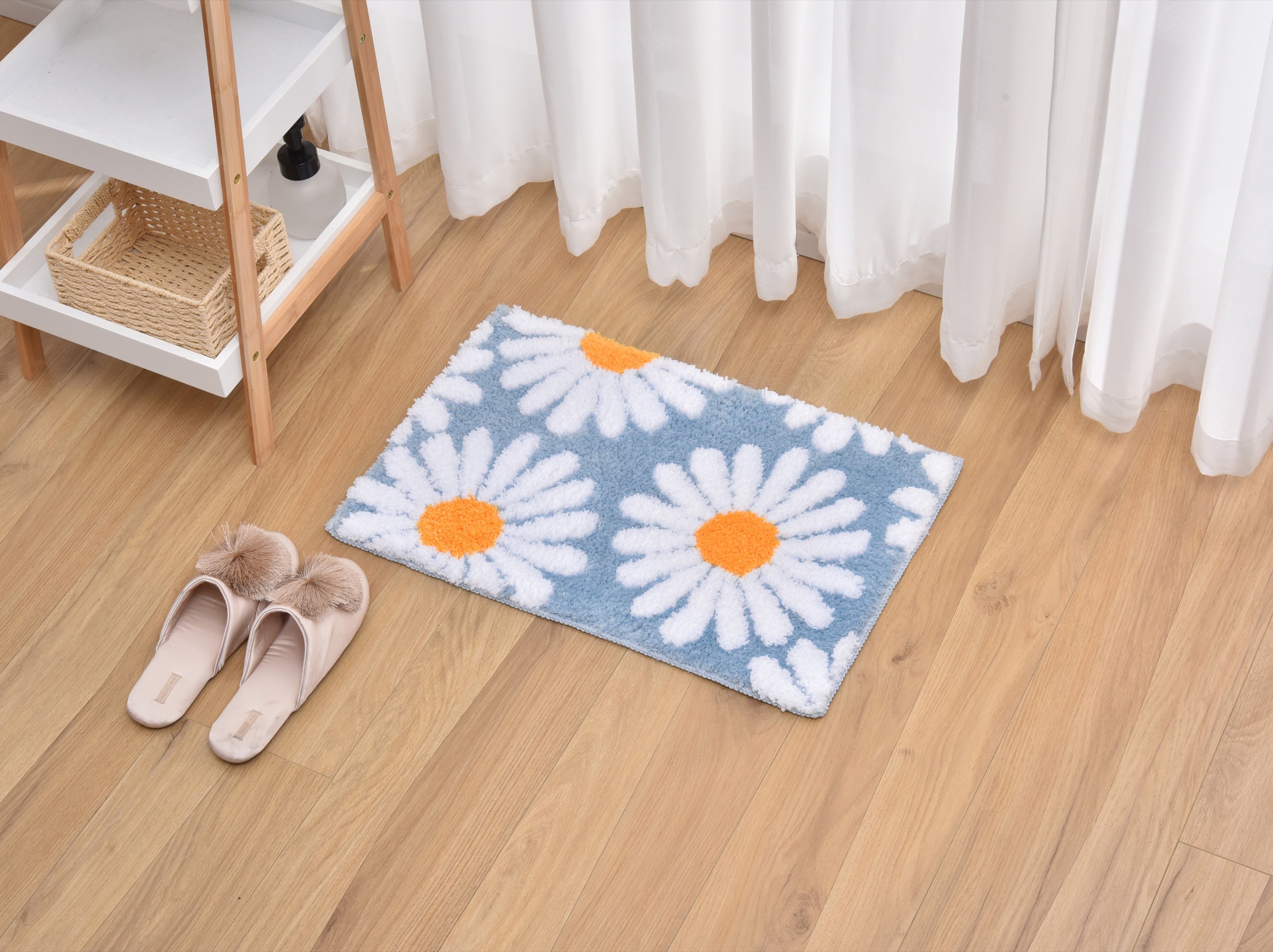 Blue daisy Feblilac runner beside a curtain and slippers