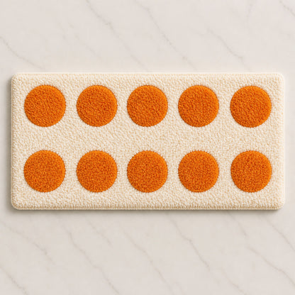Flat lay of Feblilac moon phase runner rug with orange dots
